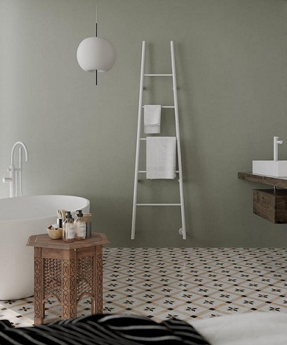 Jeeves A Tangent L heated ladder rail in white makes a bold statement in this contemporary bathroom